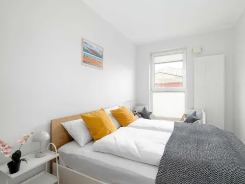 Red and Grey Apartment for 8 People in Poznań with Parking by Noclegi Renters, photo 2 of 10
