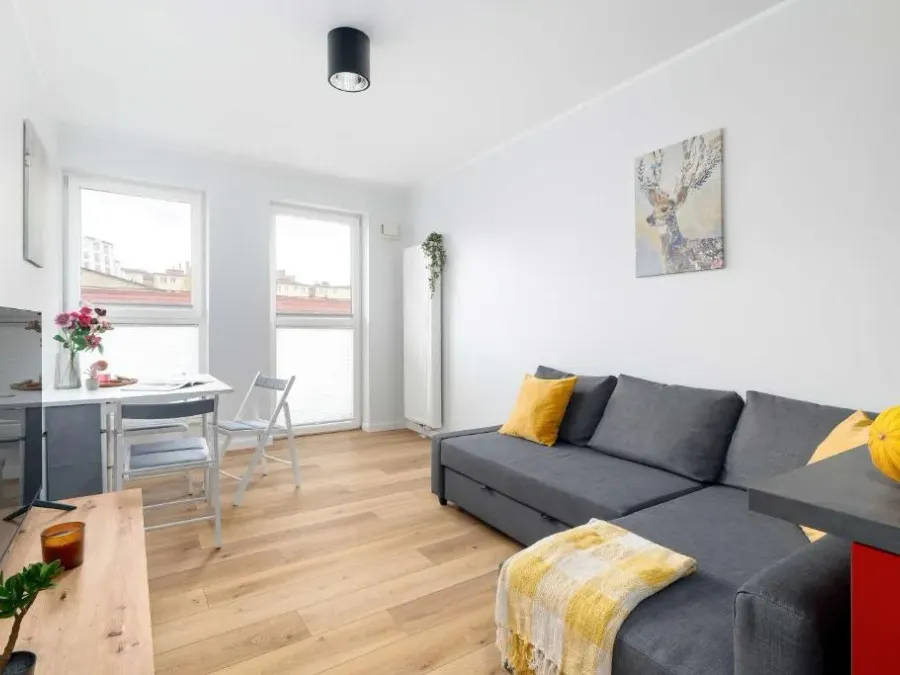 Red and Grey Apartment for 8 People in Poznań with Parking by Noclegi Renters, photo 1 of 10