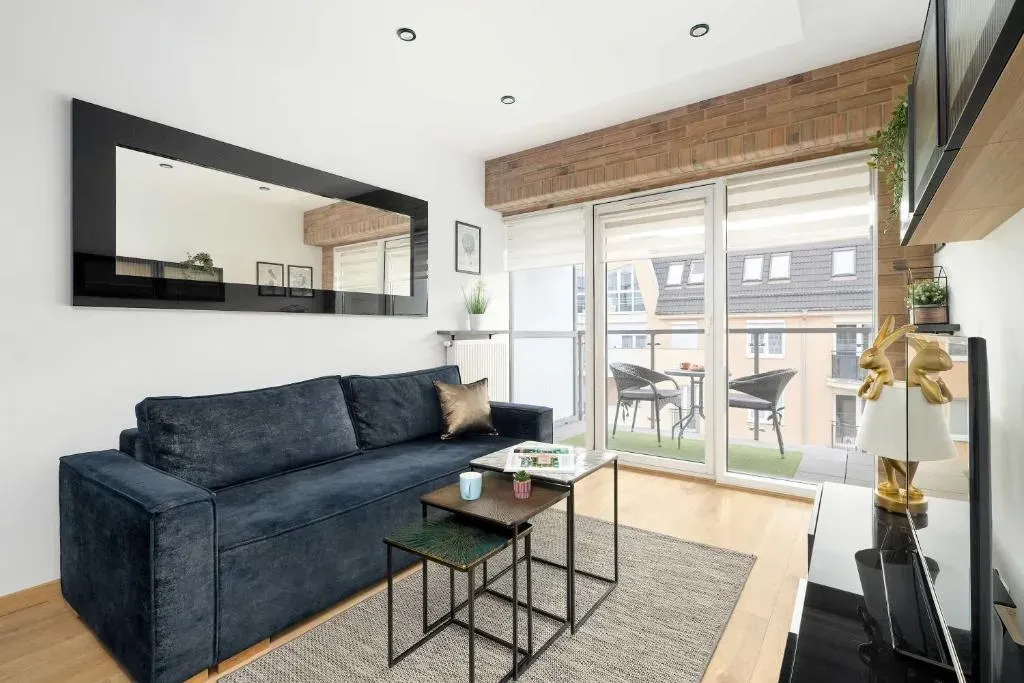 Modern Family Apartment with Parking and Balcony in the City Center by Noclegi Renters, photo 1 of 10