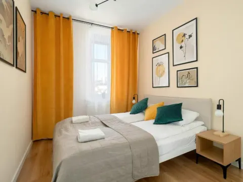 Yellow Apartment in Poznań with Air Conditioning and Desk for Remote Work by Noclegi Renters, photo 2 of 10