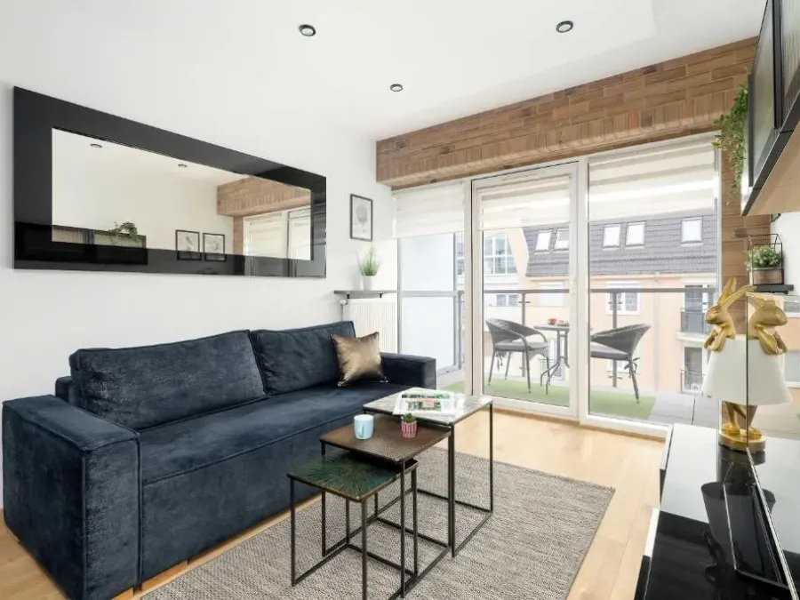 Modern Family Apartment with Parking and Balcony in the City Center by Noclegi Renters, photo 1 of 10