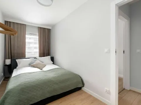Beige and Green Two Bedroom Apartment in Poznań with Parking and Bathtub by Noclegi Renters, photo 2 of 10